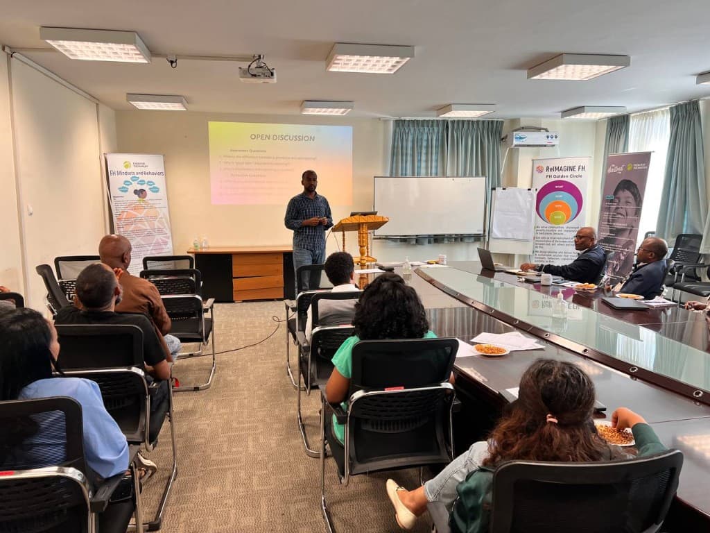 Facilitator leading an open discussion workshop with ministry leaders